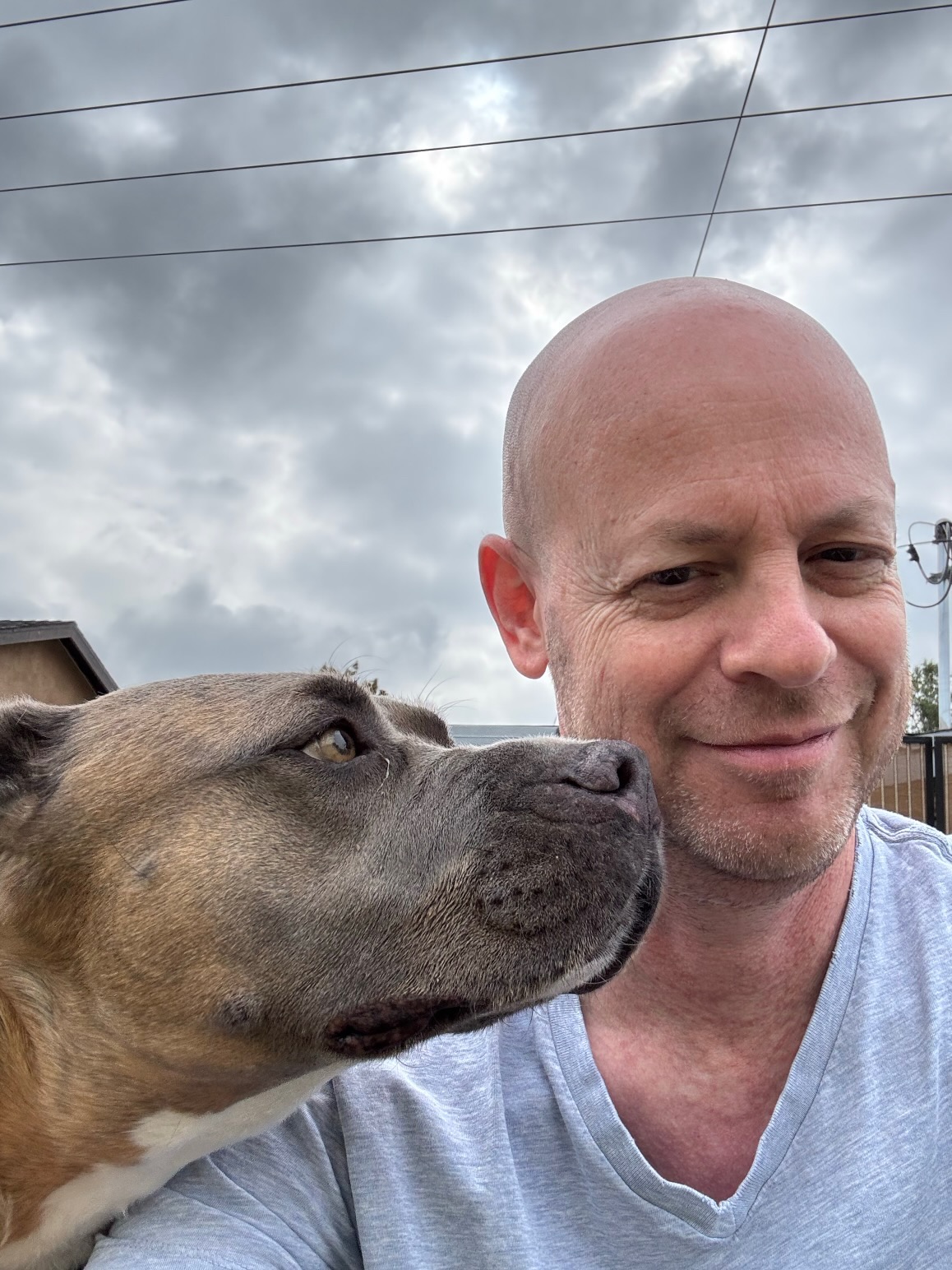 Marc with a dog outdoors